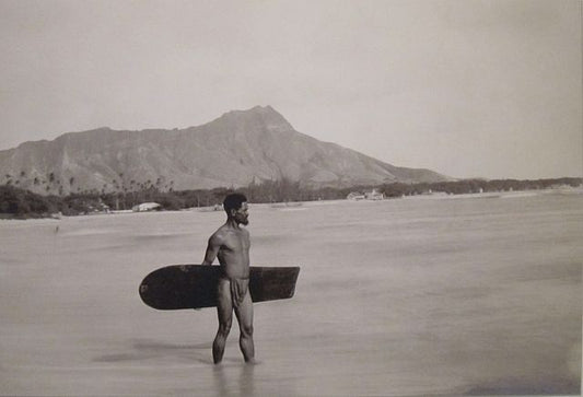 vintage image of Hawaiian surfer on the beach